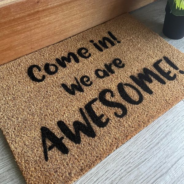 Doormat that says 'Come in! We are AWESOME!'