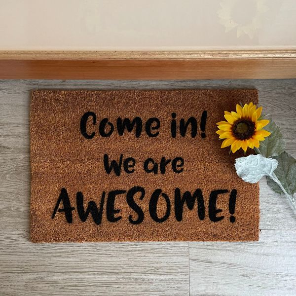 Doormat that says 'Come in! We are AWESOME!'