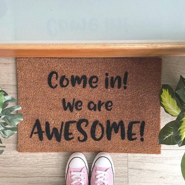Doormat that says 'Come in! We are AWESOME!'