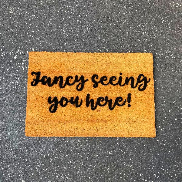 Doormat that says 'Fancy seeing you here!'