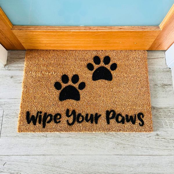 Wipe Your Paws doormat with two paw prints