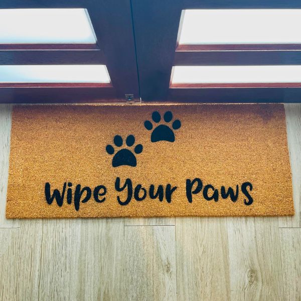 Large Wipe Your Paws doormat with two paw prints