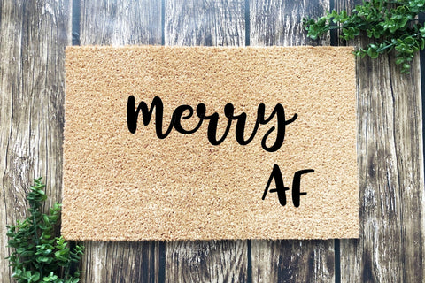 Doormat that says Merry AF